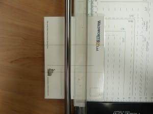 Using the guillotine, cut along your marked lines